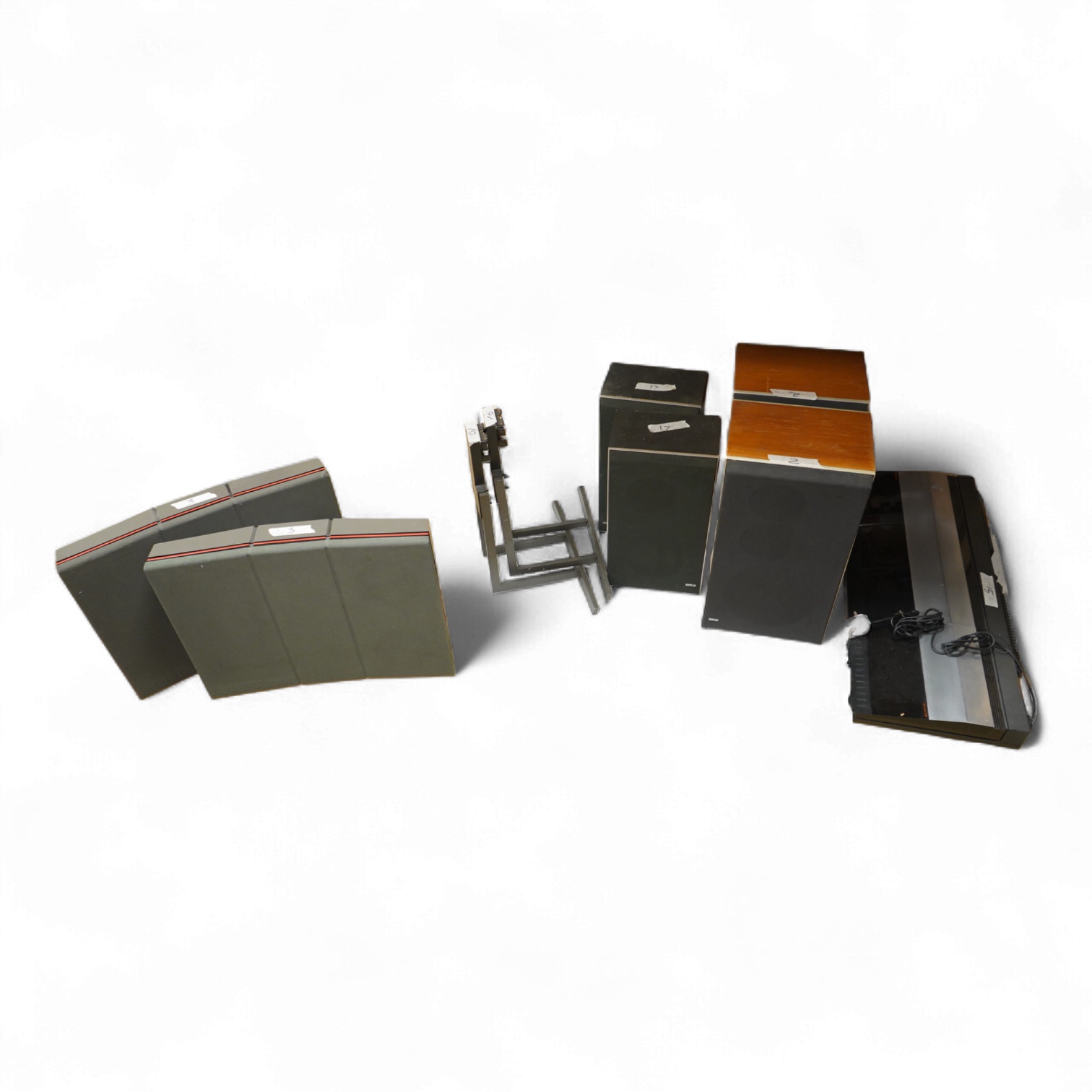 A collection of Bang & Olufsen stereo equipment, including; a Beocentre 2200 together with a pair of the related Beovox X25 speakers, plus a pair of Redline R60 floor standing speakers with their stands, and a pair of Be